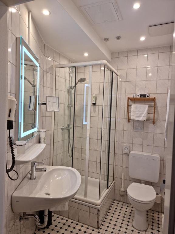 Koupelna v ubytování Hotel Nassauer Hof