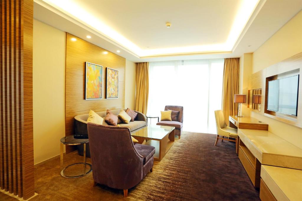 TV a/nebo společenská místnost v ubytování Shenzhen Baoan PLUS Gems Cube Hotel