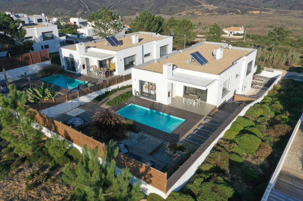 an aerial view of a house with a swimming pool at Cairnvillas - Villa Mar C38 Luxury Villa with Private Swimming Pool near Beach in Aljezur