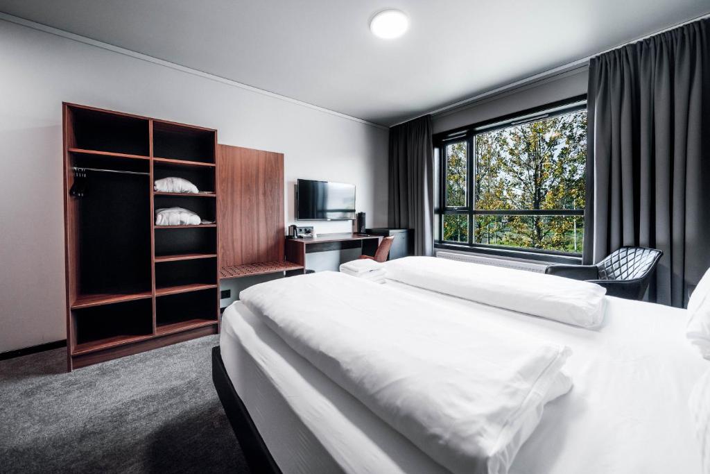 Letto o letti in una camera di Blue Hotel Fagrilundur - On The Golden Circle