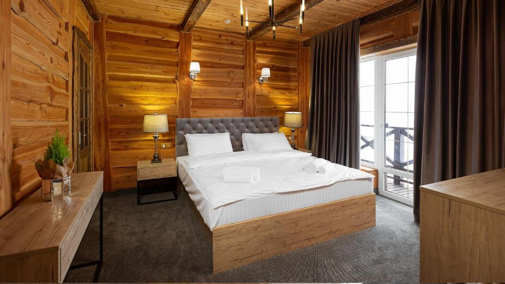 Postel nebo postele na pokoji v ubytování SVOI Hotel