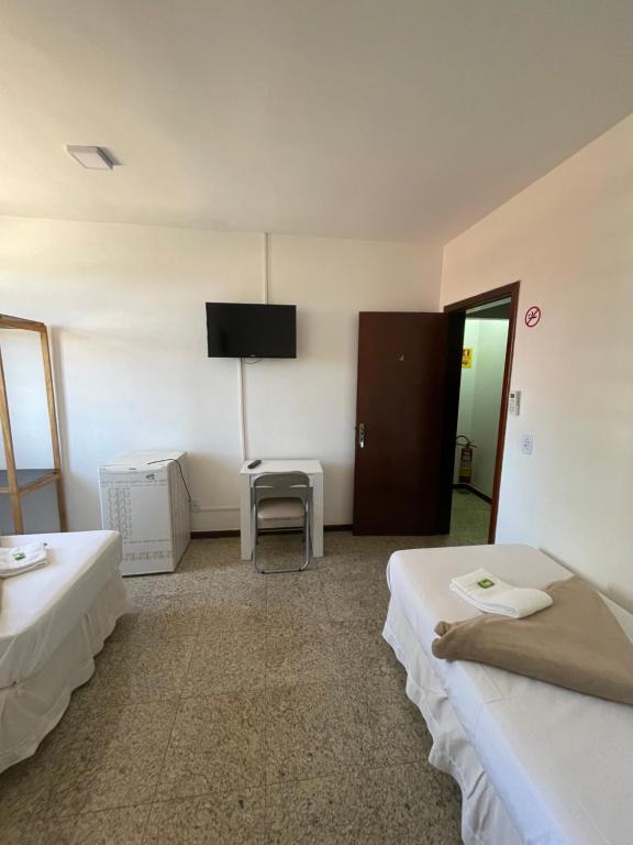 Postel nebo postele na pokoji v ubytování Pousada Vitória da Vila