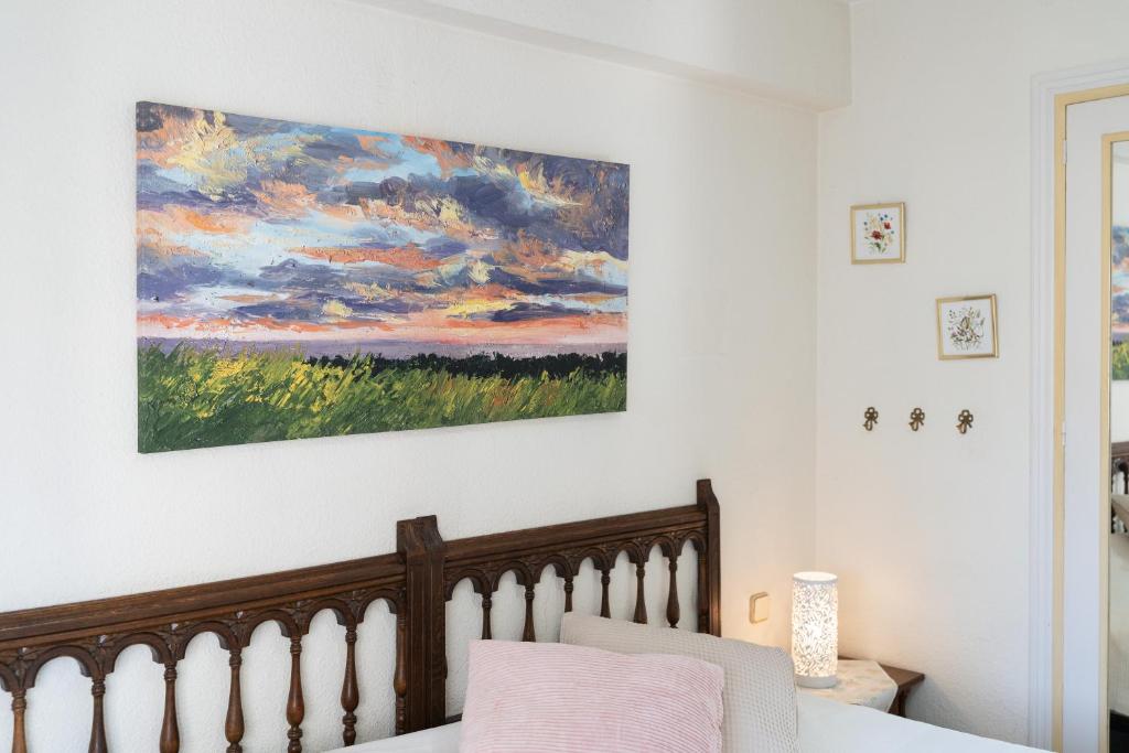 A bed or beds in a room at Apartamento Torres ll