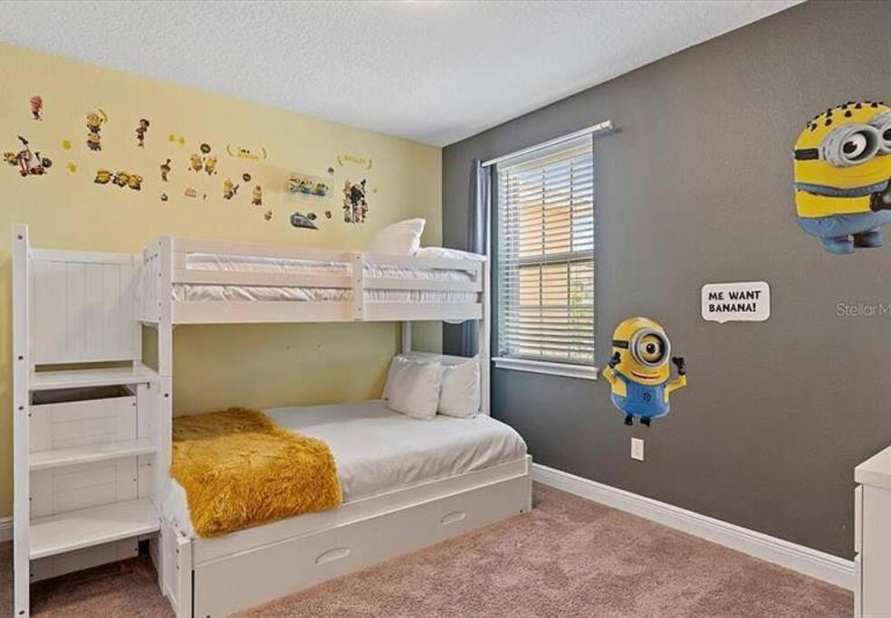a childs bedroom with a bunk bed and a room at 371 P Luxury Villa- New Listing in Orlando