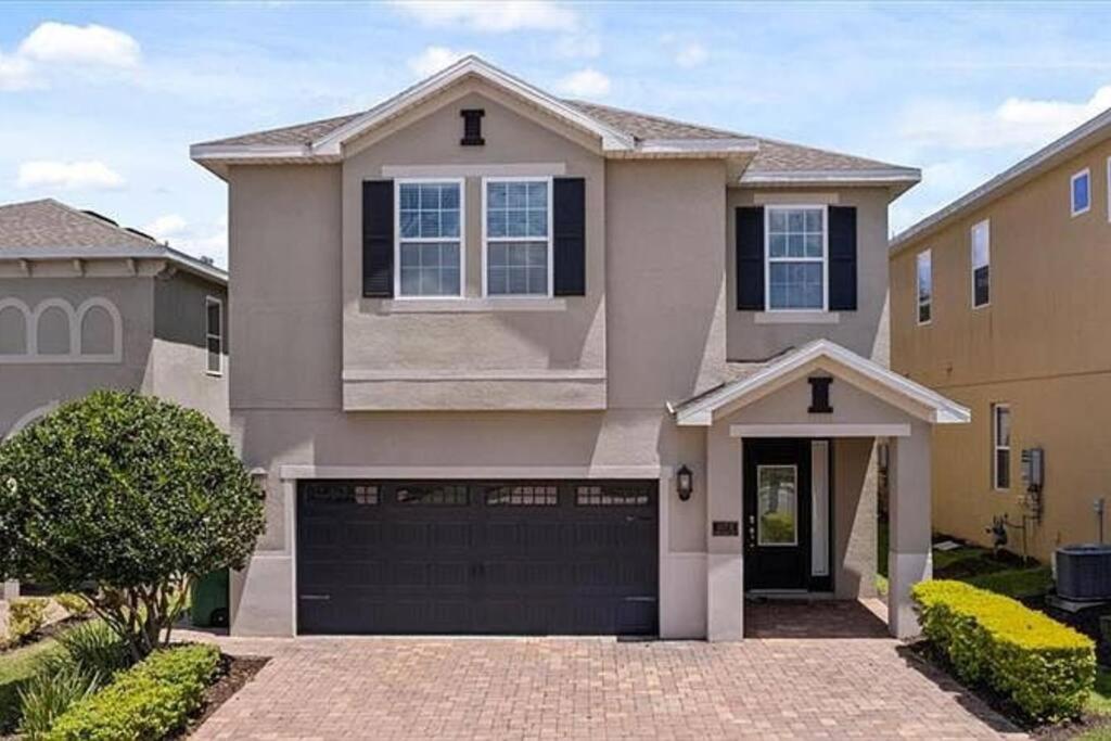 a large house with a garage at 371 P Luxury Villa- New Listing in Orlando