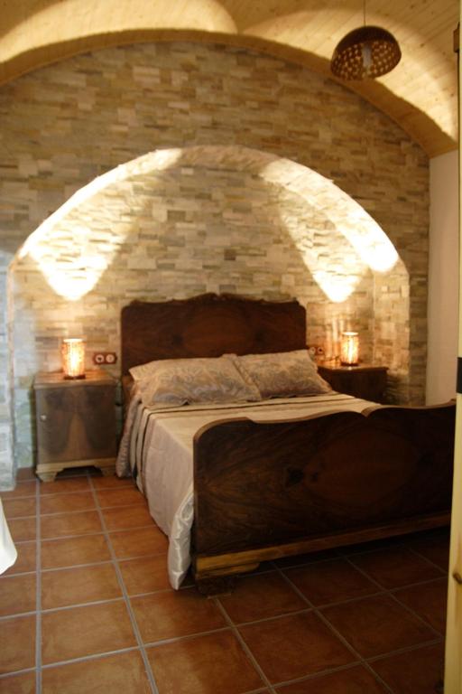 Postel nebo postele na pokoji v ubytování Cuevas las Chimeneas