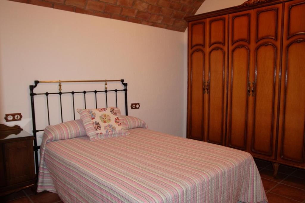 Postel nebo postele na pokoji v ubytování Cuevas las Chimeneas