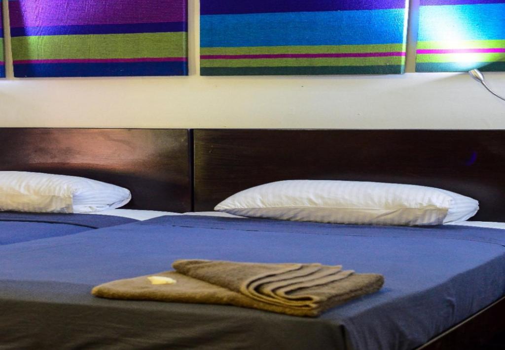Postel nebo postele na pokoji v ubytování Hangover Hostels Mirissa