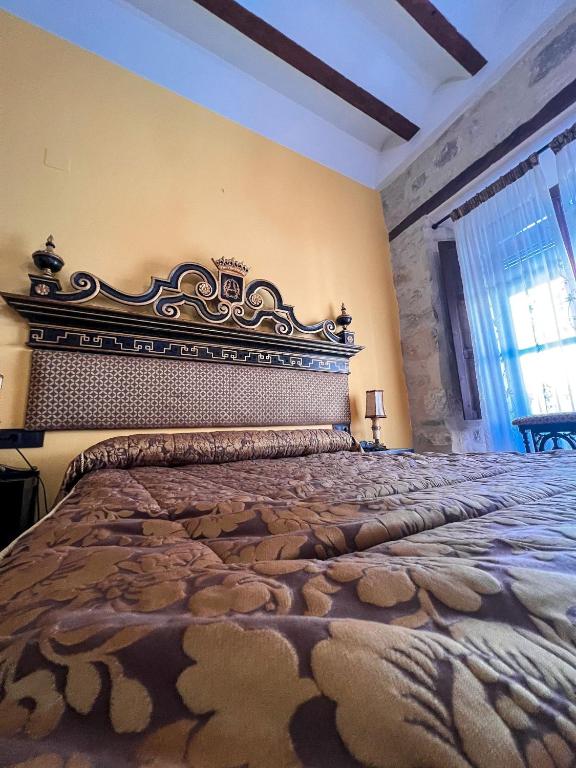 Łóżko lub łóżka w pokoju w obiekcie VTAR Casa las Tinajas