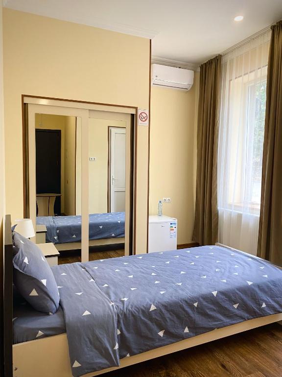 Postel nebo postele na pokoji v ubytování Telav Holl