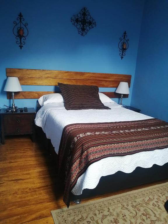 Postel nebo postele na pokoji v ubytování Kori Gems Inn