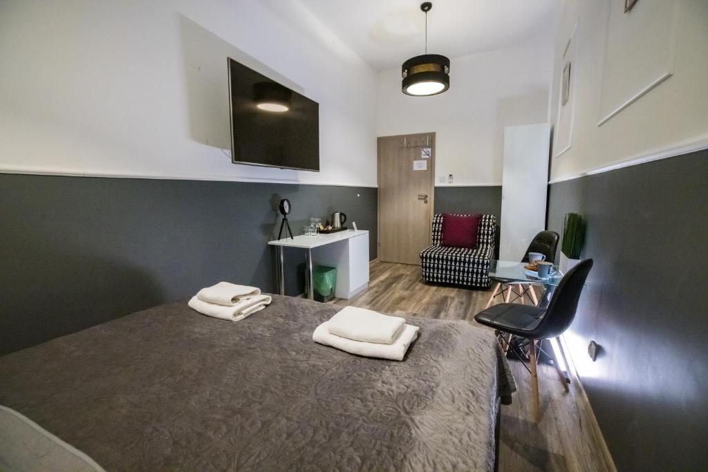 Posteľ alebo postele v izbe v ubytovaní Leo Apartments Main Square