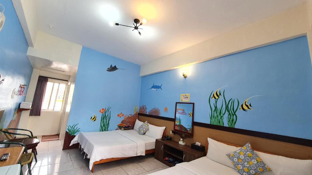 Postel nebo postele na pokoji v ubytování Lang Jiao Ya She Homestay