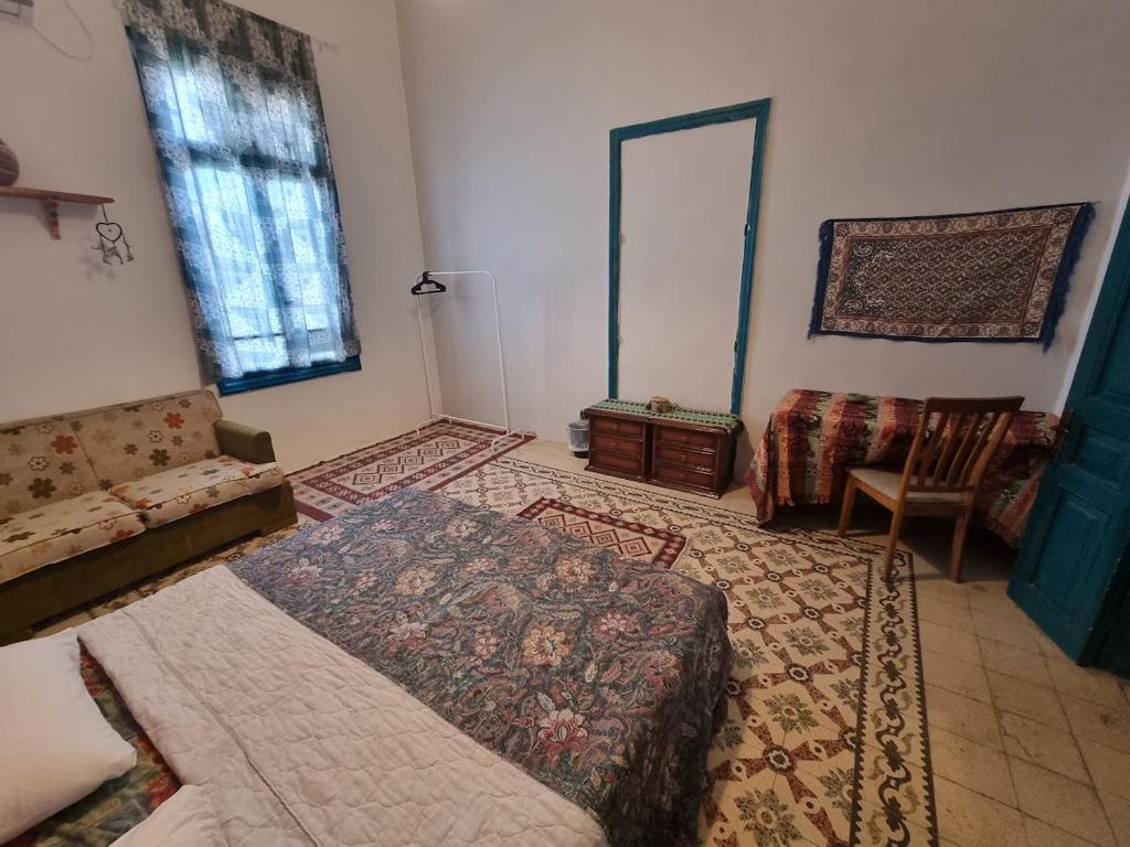 Postel nebo postele na pokoji v ubytování Shams House