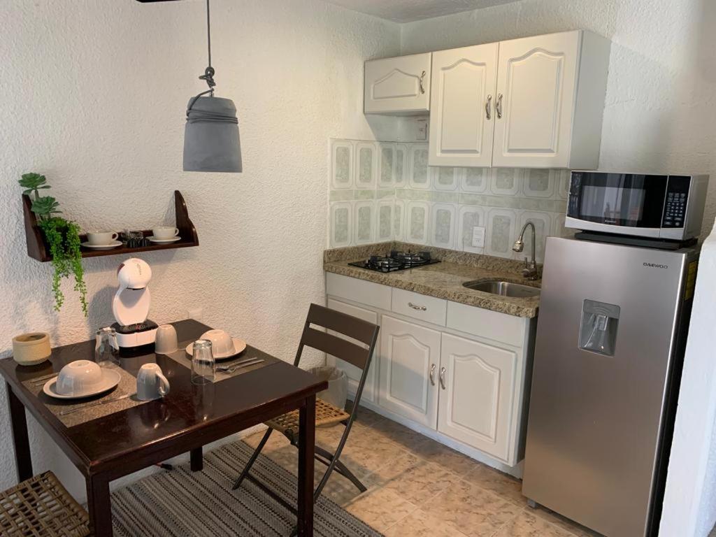 Kuchyň nebo kuchyňský kout v ubytování Hotel Posada Santa Fe