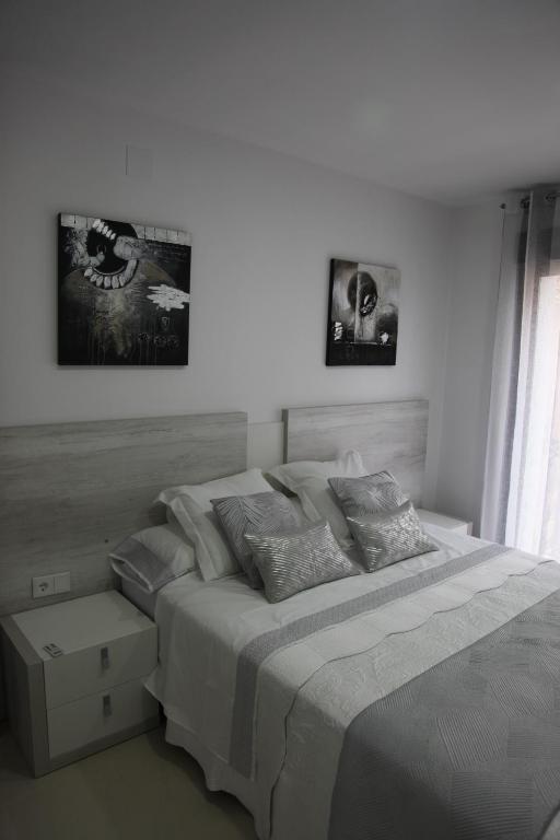 Postel nebo postele na pokoji v ubytování Apartamentos Alogia, Pastora, Yerbater
