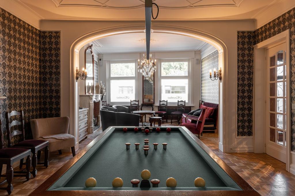 Biliár nebo kulečník v ubytování B&B Herenhuis