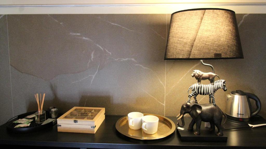 Coffee and tea making facilities at Duomo Housing Catania Le Suites