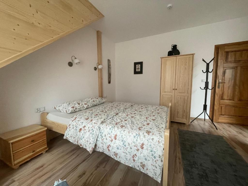 Postel nebo postele na pokoji v ubytování Kolejowy Smolnik