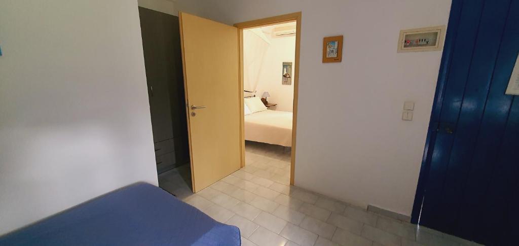 A bed or beds in a room at Irini Studios