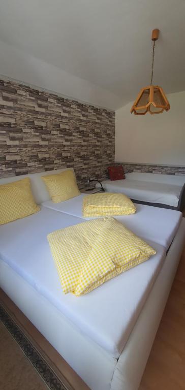 Postel nebo postele na pokoji v ubytování Apia House