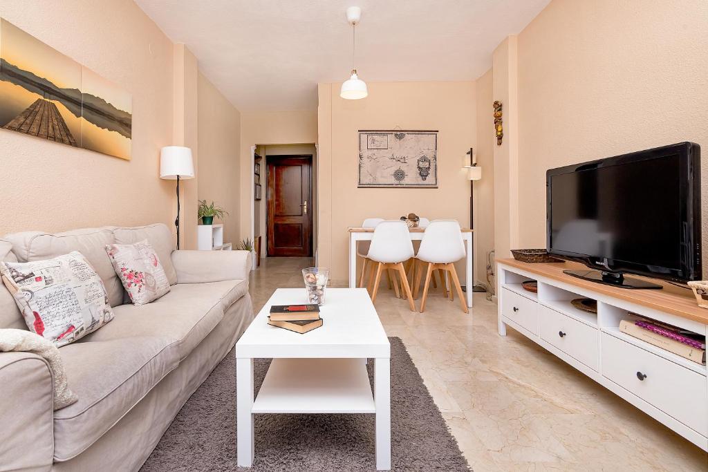 A television and/or entertainment centre at Sunshine Balcony- La Caleta