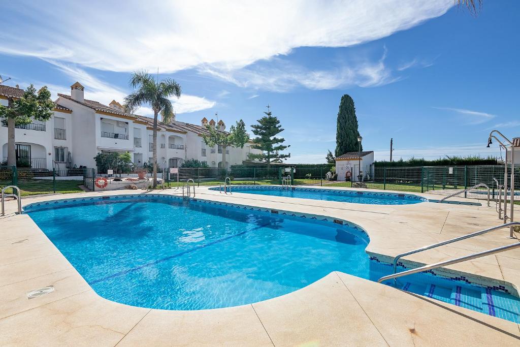 The swimming pool at or close to Sunshine Balcony- La Caleta