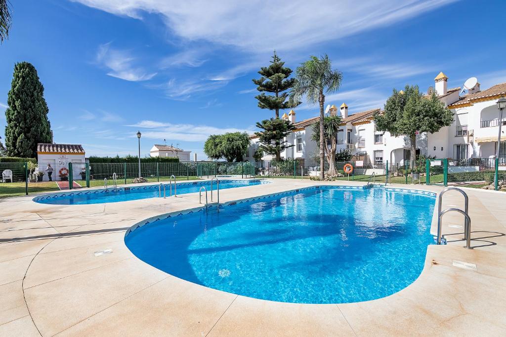 The swimming pool at or close to Sunshine Balcony- La Caleta