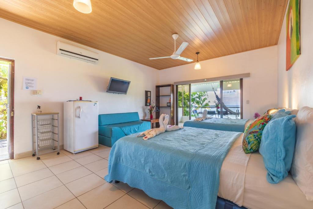 Postel nebo postele na pokoji v ubytování Hotel Villas de la Selva