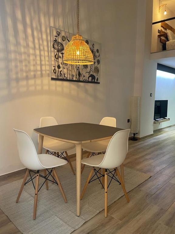 Una televisión o centro de entretenimiento en Precioso loft en Olula del Río