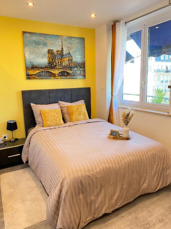 Posteľ alebo postele v izbe v ubytovaní Paris Homestay of Happyness