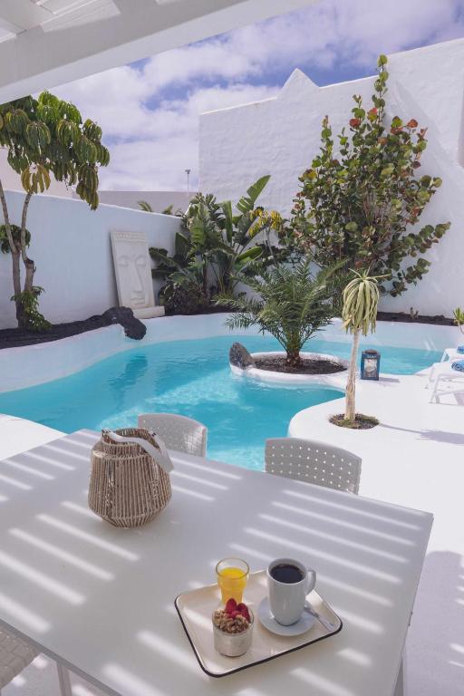 Bazén v ubytovaní Villa Guajara Piscina Climatiz Jacuzzi Villa 714 alebo v jeho blízkosti