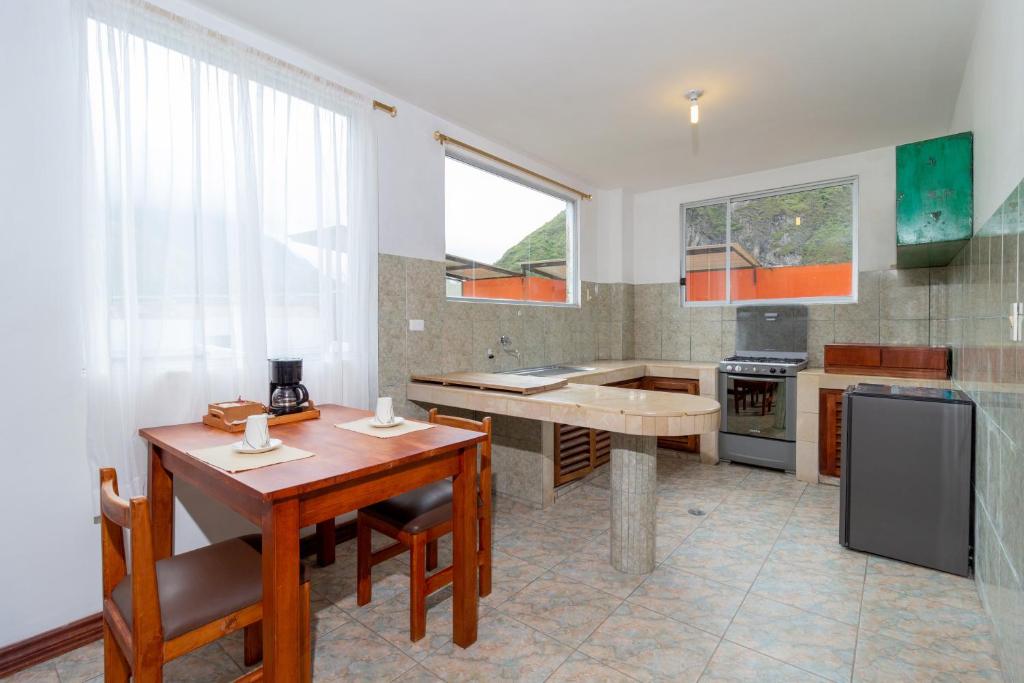 Kuchyň nebo kuchyňský kout v ubytování Napolitano Apart Hotel
