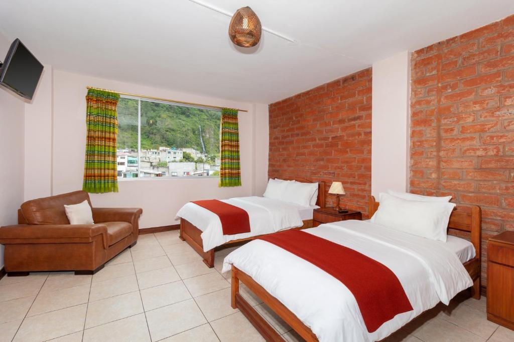 Postel nebo postele na pokoji v ubytování Napolitano Apart Hotel