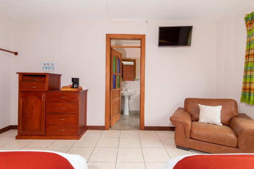 TV a/nebo společenská místnost v ubytování Napolitano Apart Hotel