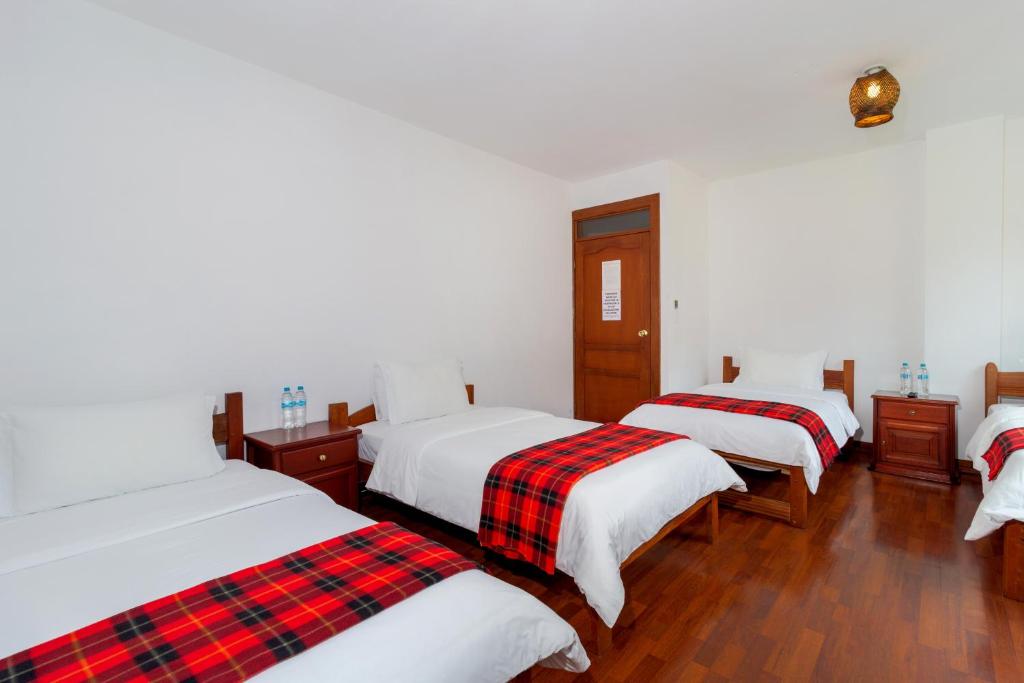 Postel nebo postele na pokoji v ubytování Napolitano Apart Hotel