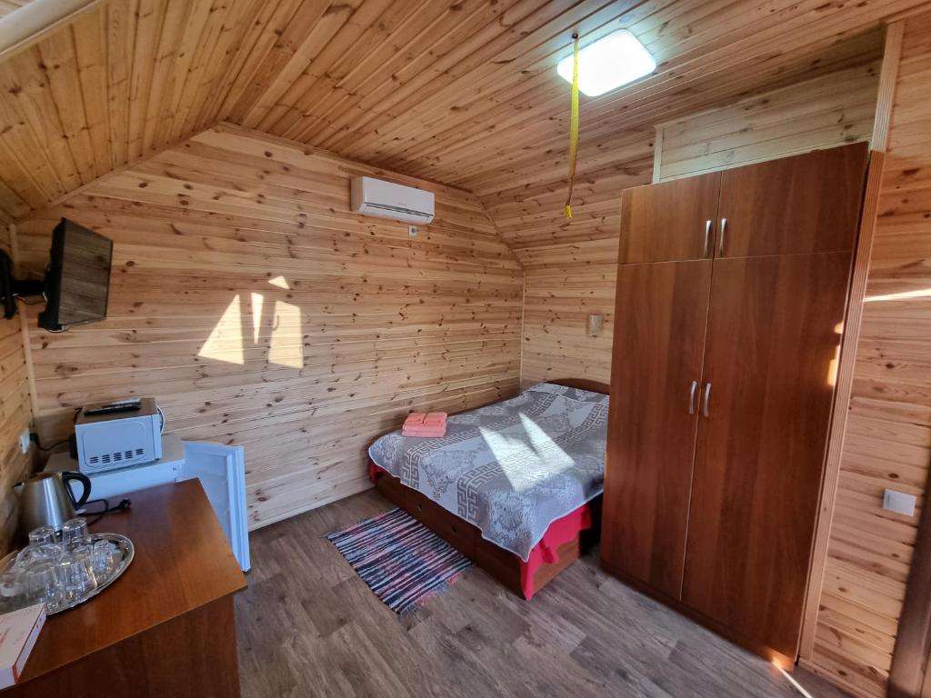 TV a/nebo společenská místnost v ubytování Шафран