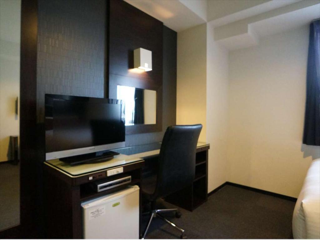 TV a/nebo společenská místnost v ubytování Green Rich Hotel Osaka Airport