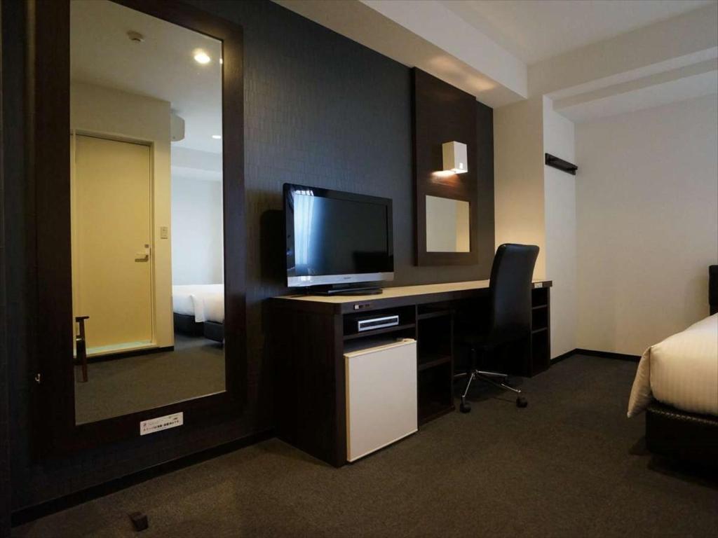TV a/nebo společenská místnost v ubytování Green Rich Hotel Osaka Airport