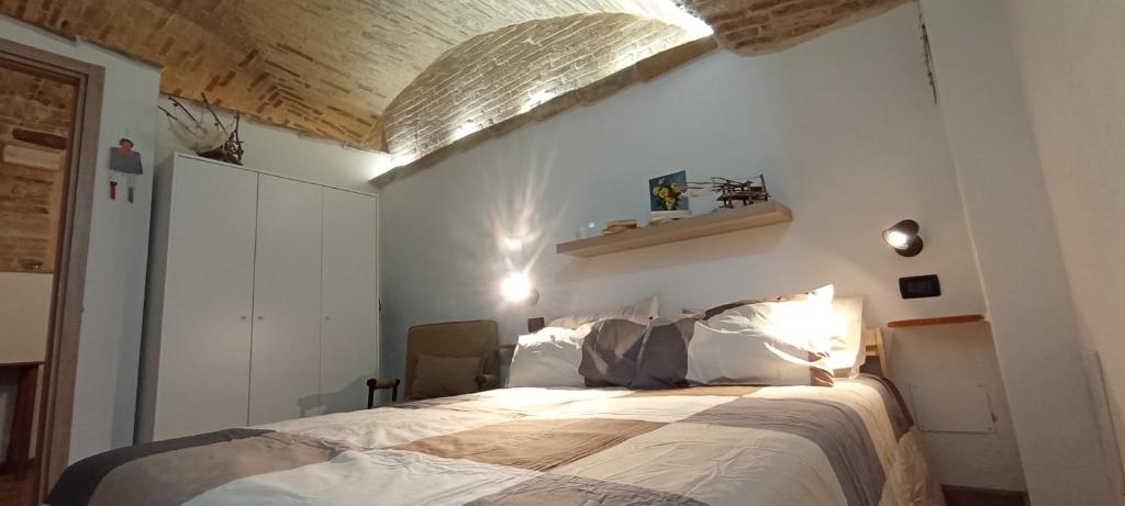 a bedroom with a large bed in a room at B&B via Cavour in Lanciano
