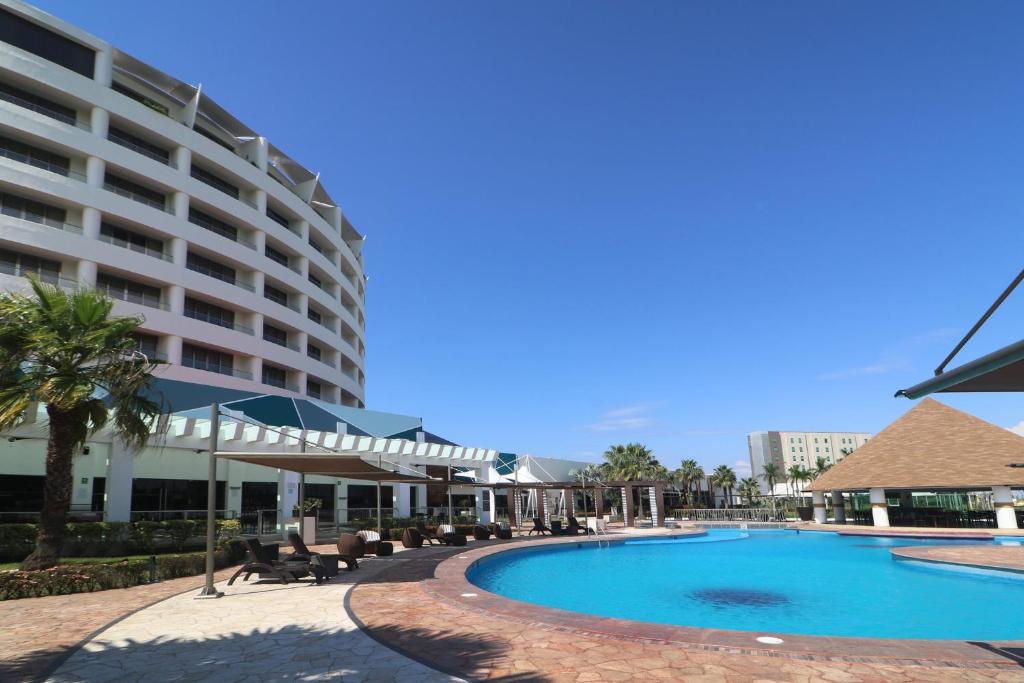 Bazén v ubytování Holiday Inn Tuxpan - Convention Center by IHG nebo v jeho okolí