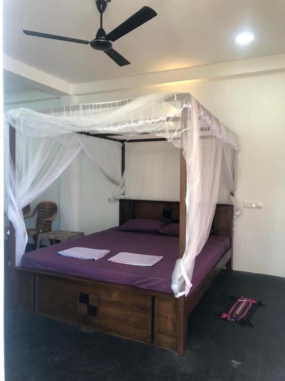 Letto o letti in una camera di SunRay Rest - Beach View Homestay