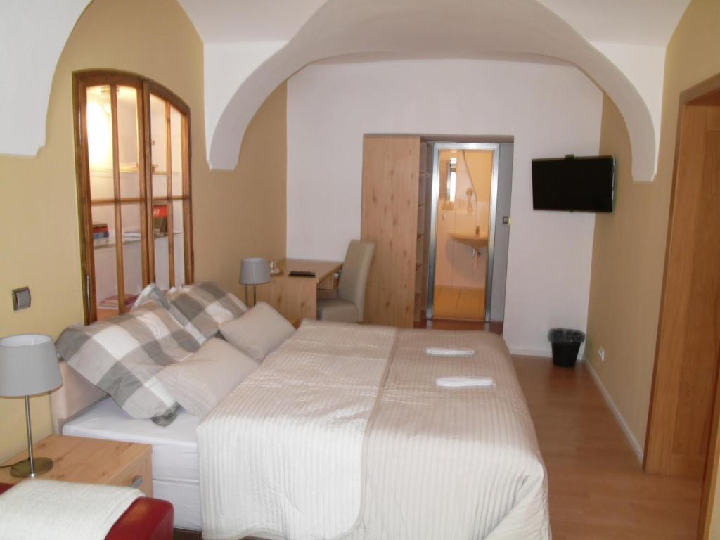 Televízia a/alebo spoločenská miestnosť v ubytovaní Apartments and Suites Kremnica