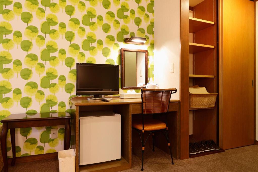 TV a/nebo společenská místnost v ubytování Heidihof Hotel