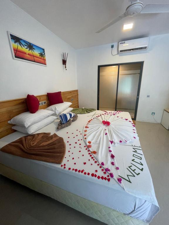 Postel nebo postele na pokoji v ubytování Royal Stay Inn