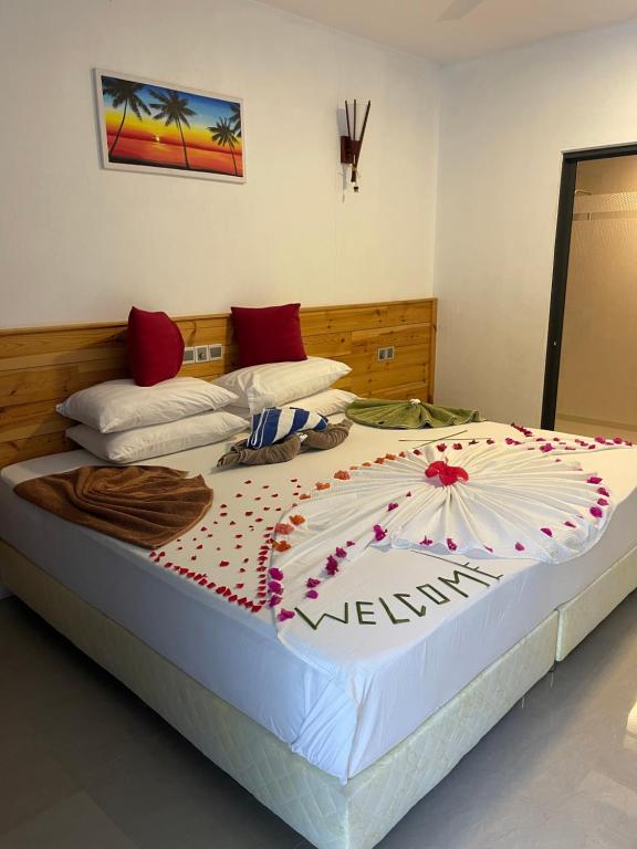Postel nebo postele na pokoji v ubytování Royal Stay Inn