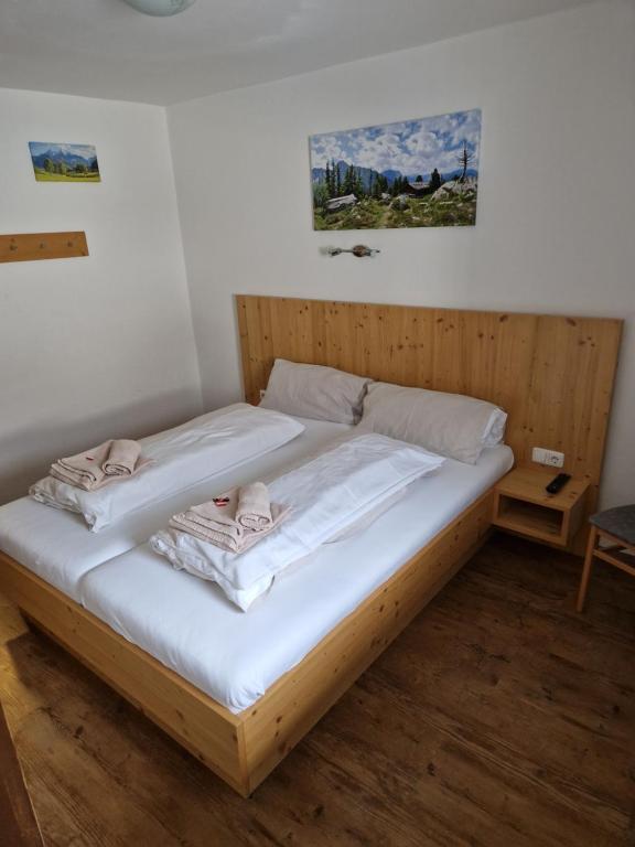 Postel nebo postele na pokoji v ubytování Gasthof Post