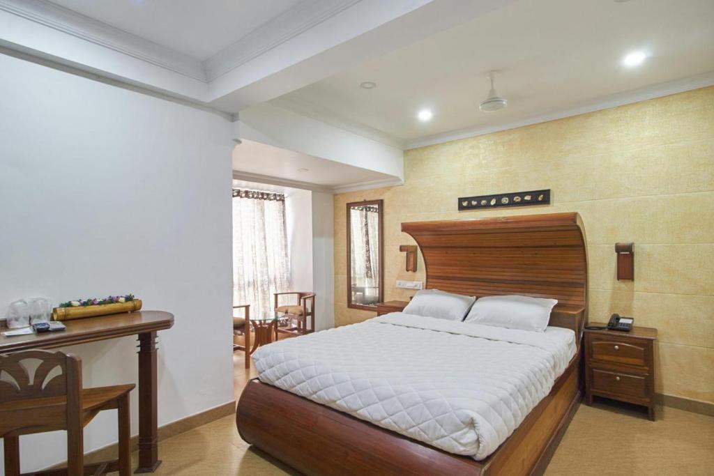 Postel nebo postele na pokoji v ubytování Hotel Mart View