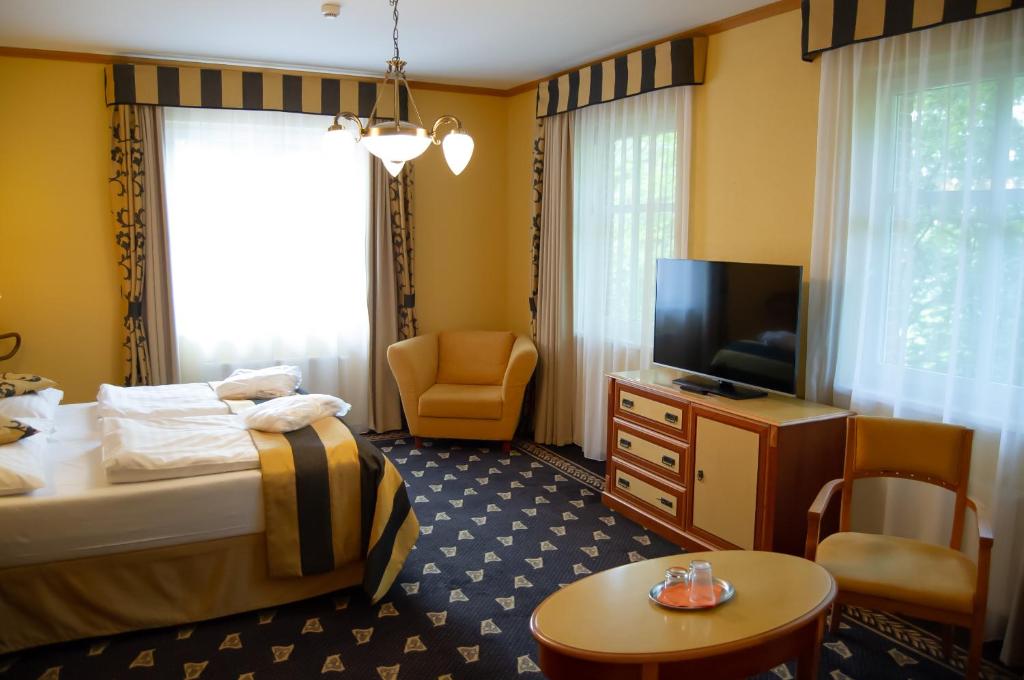 Postel nebo postele na pokoji v ubytování Hotel Richard Spa & Wellness