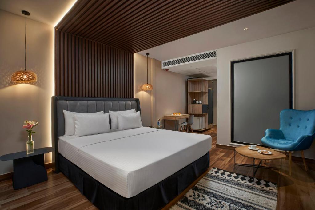 Postel nebo postele na pokoji v ubytování Avataara Resort & Spa